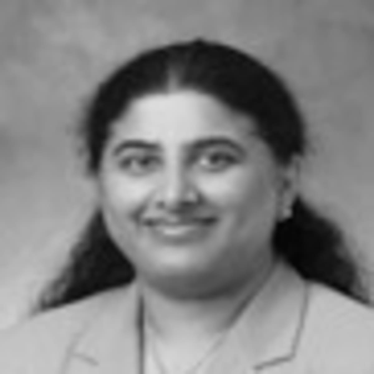 Dr. Caroline Mathew, MD, BS, MBBS Flint, MI Internist