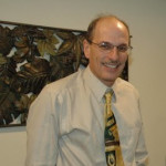 Dr. Norman C John, DDS