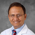 Dr. Mani Menon MD