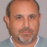 Eric S Suris