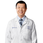 Dr. Xingyi Que, MD