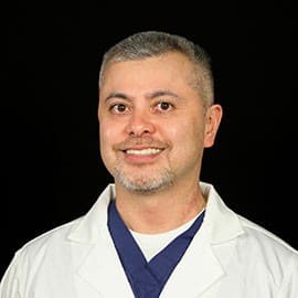 Dr. Charles John Gutierrez