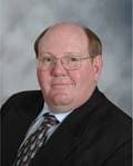 Dr. Dennis Charles Woodall, MD