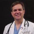 Dr. C Mark Riggenbach
