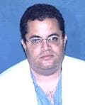 Dr. John Carmelo Ayala, MD