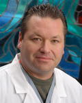 Dr. Roland Edward Benton, MD
