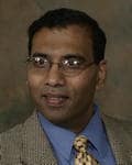 Dr. Andy K Somesan, MD
