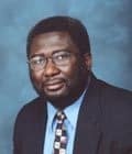 Dr. James K Aikins