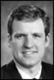 Dr. John Cletus Paumier, MD