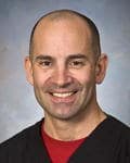 Dr. Christopher E Gelmann