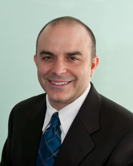 Dr. Mark A Theriault