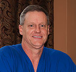 Dr. Curt E Conrad, DDS