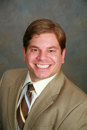 Dr. Andrew G Briese