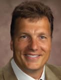 Dr. John M Carrels, DDS