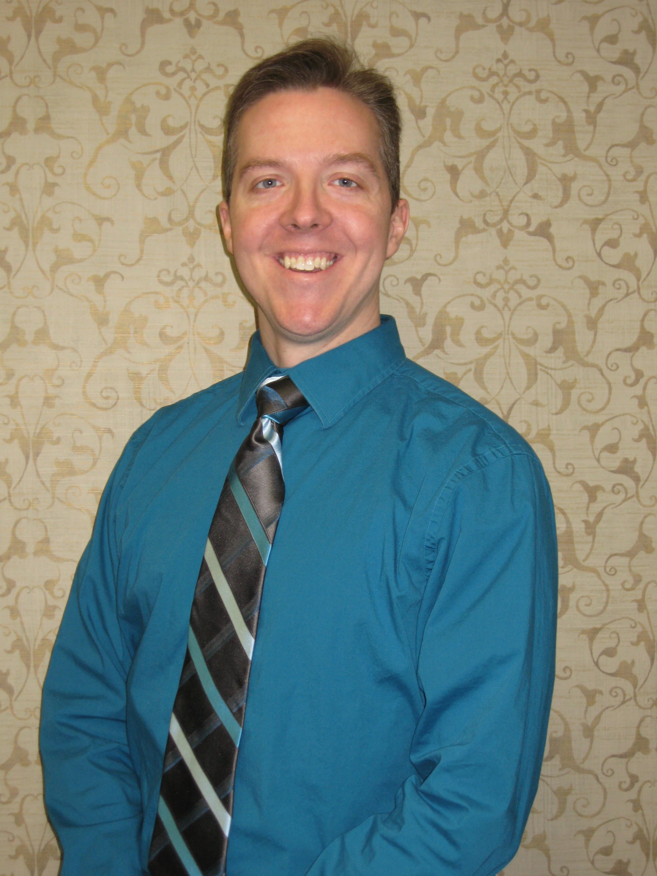 Dr. Joseph E Touhalisky, DDS