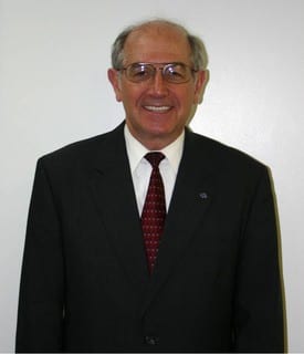 Dr. John E Definnis, DDS