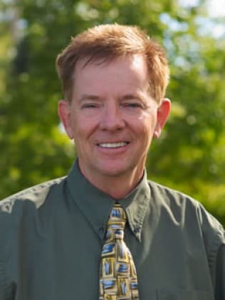 Dr. Gary L Evans, DDS