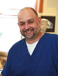 Dr. Andrius E Uzpurvis, DDS