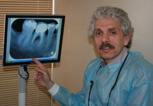 Dr. Gerald S Simmons, DDS