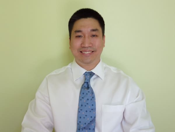 Dr. Young Woo Kim, DDS