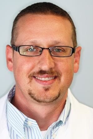 Dr. Charles J Schein, DDS