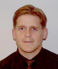 Dr. Justin Thomas Mans, MD