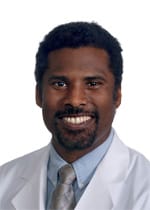 Dr. Heinric Williams, MD