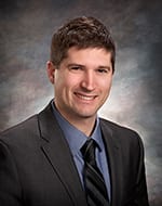Dr. Justin Aaron Simpson, DO