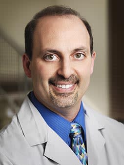 Dr. Carmen J Scarimbolo
