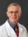 Dr. Yasser M Karim, MD