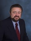 Dr. Thomas Neuman, MD