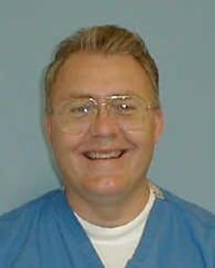 Dr. Patrick Gill, MD