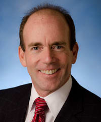 Dr. John Patrick Woll, MD