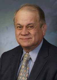 Dr. Luis E Bustos, MD