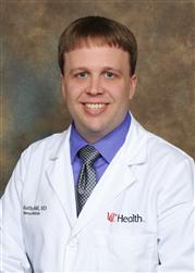 Dr. Justin David Held, MD