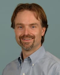 Dr. Justin C K Davis