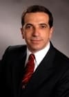 Dr. George E Kikano