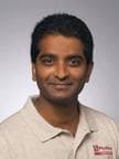 Dr. Tilak Dharma Raj, MD