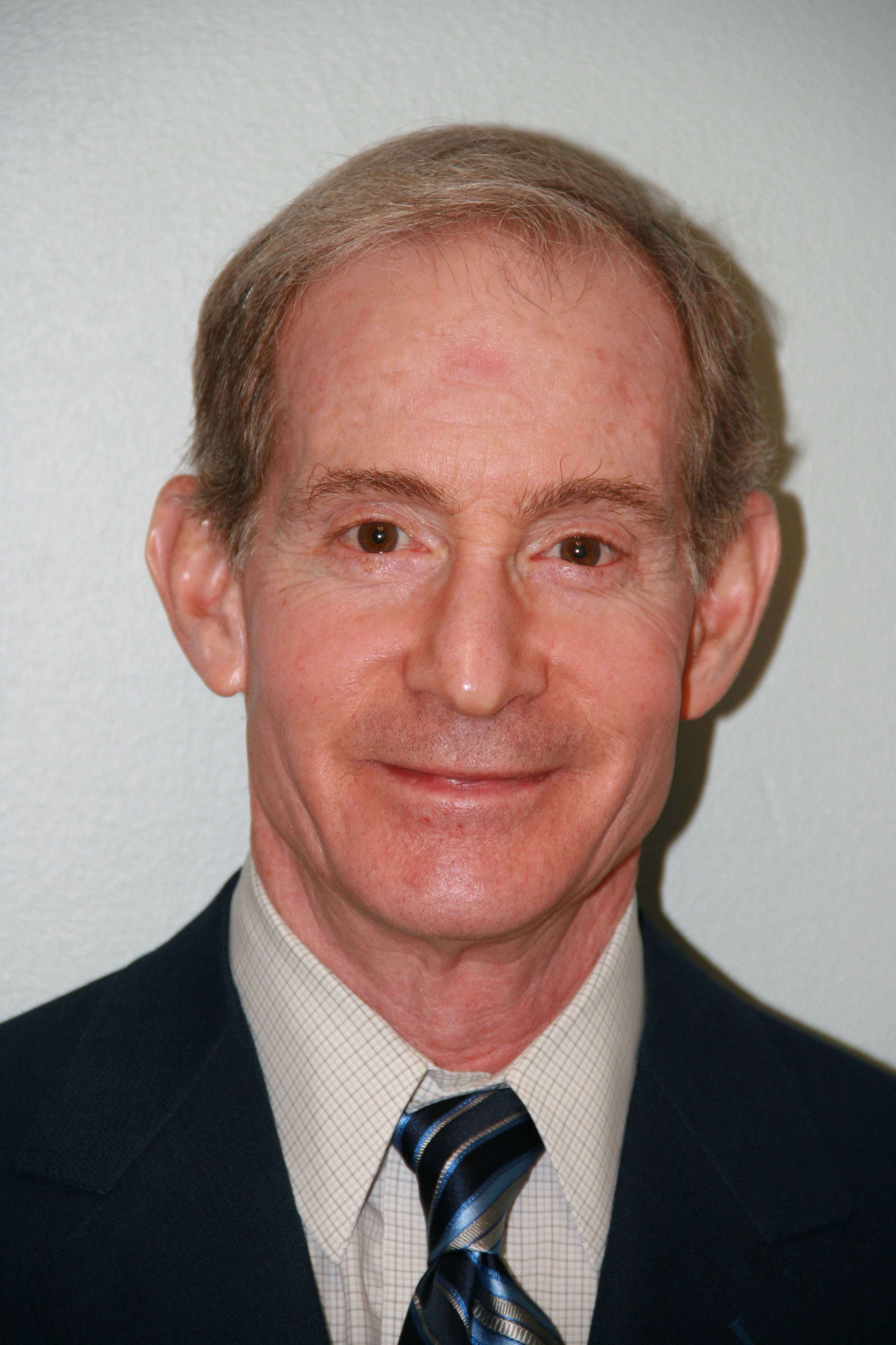 Dr. Gerald Blake Simons, MD