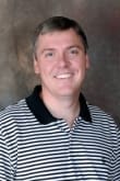 Dr. David L Brassell