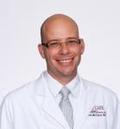 Dr. Travis Knox Mcclure