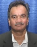Dr. Kartik Hasmuklal Shah, MD