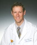 Dr. Dominic J Blurton, MD