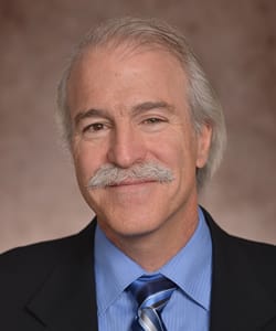 Dr. Everett James Mozell