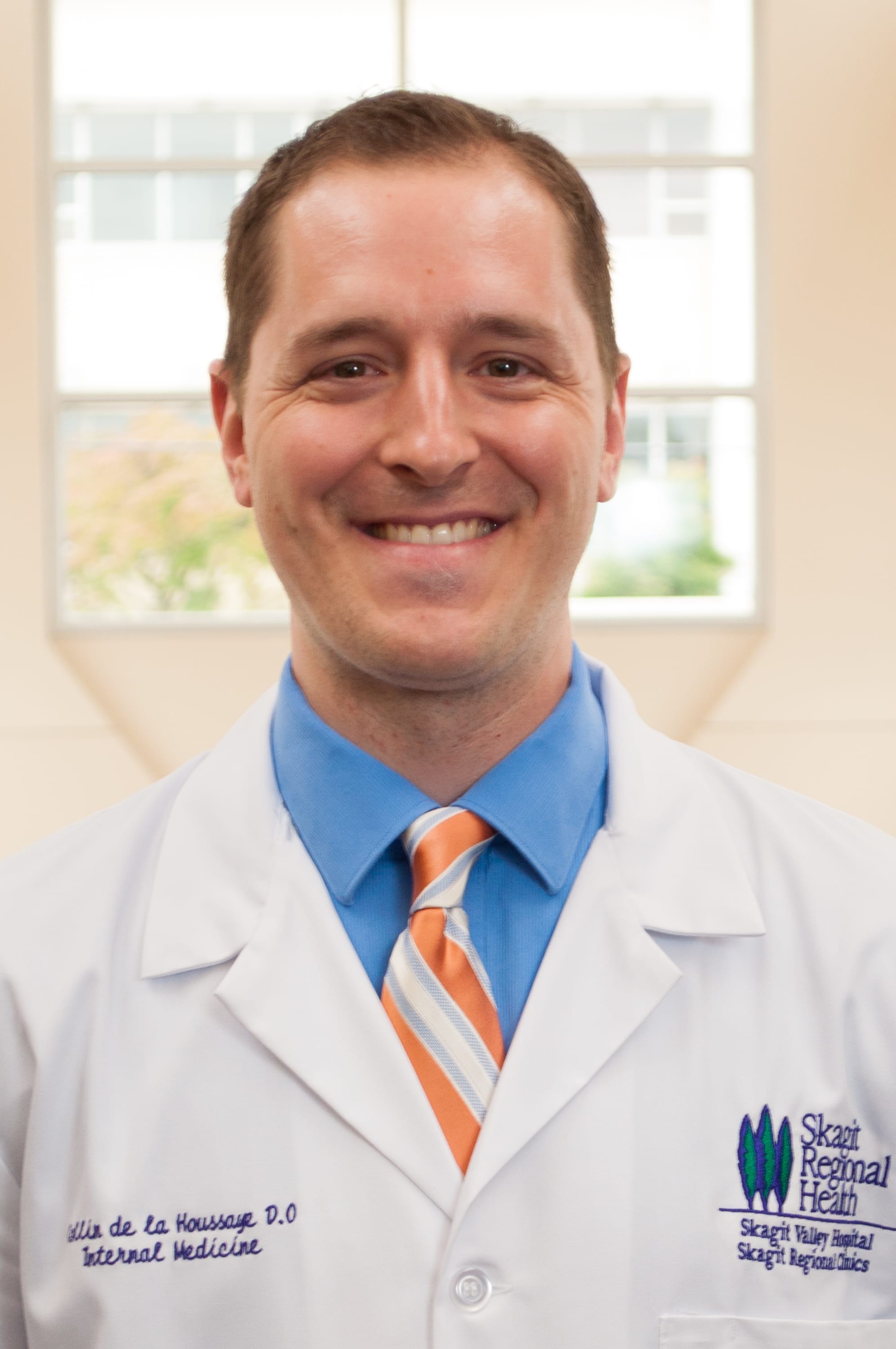 Dr. Collin Tyler Dela Houssaye, MD