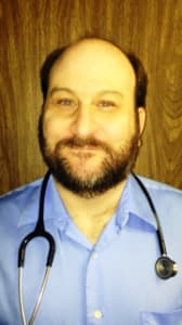 Dr. Maxim Erric Shuman, MD