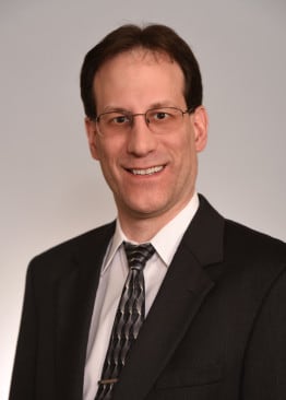Dr. Adam Howard Feldman