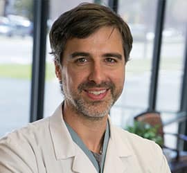 Dr. Andrew M Strang, MD